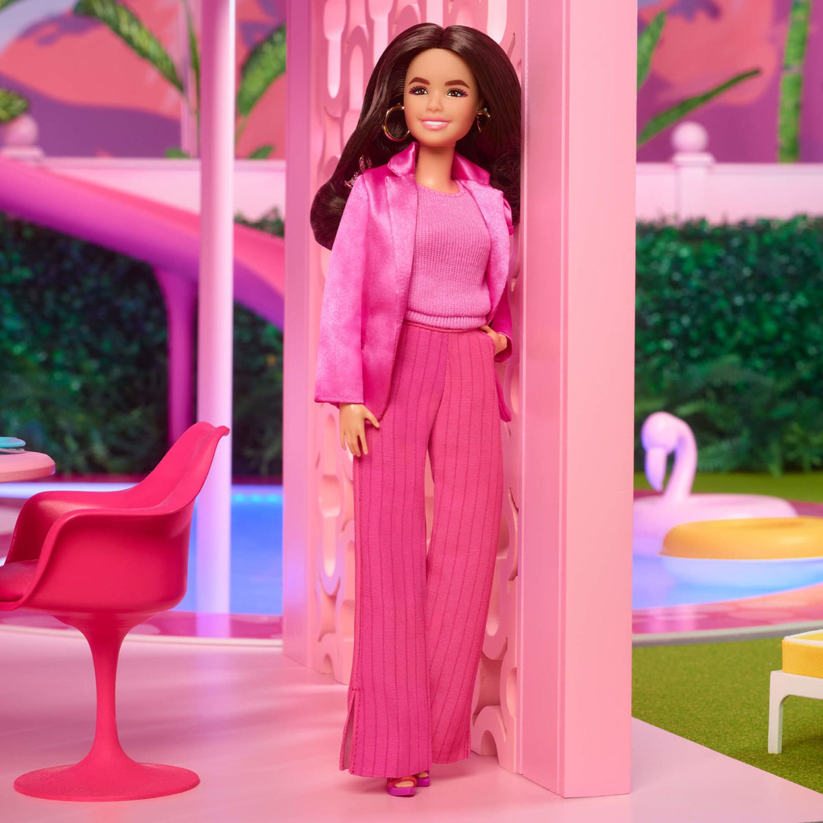 Gloria Doll Wearing Pink Power Pantsuit – Barbie The Movie