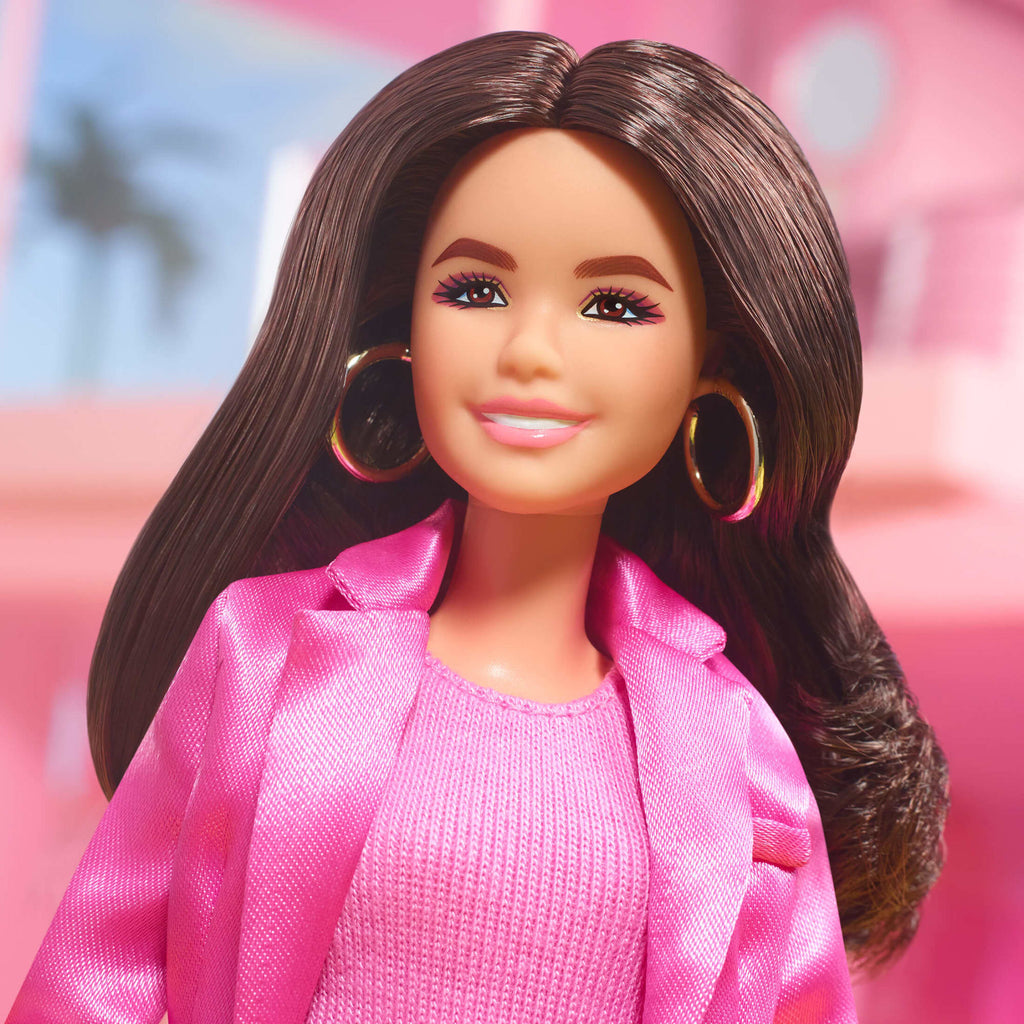 Gloria Doll Wearing Pink Power Pantsuit – Barbie The Movie